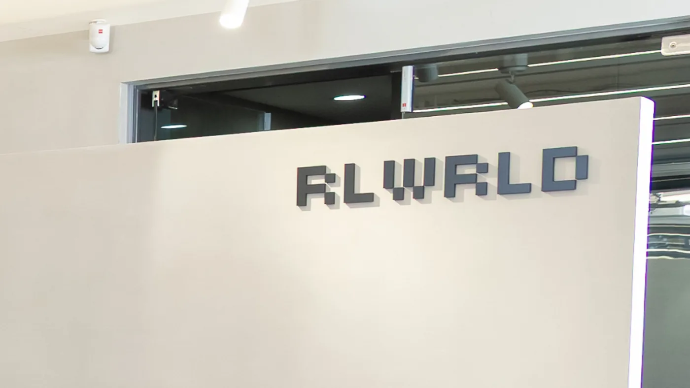 RLWRLD logo as dimensional office signage